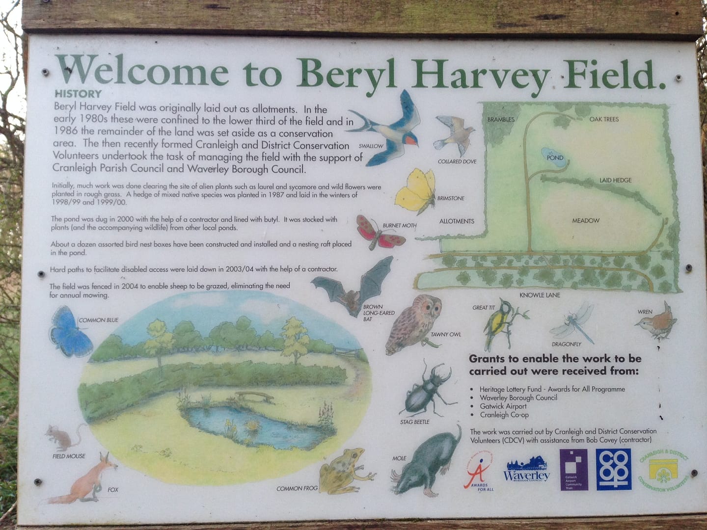 Beryl Harvey sign at entrance of field in Cranleigh