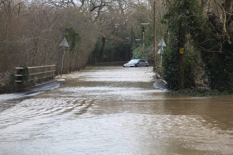 Car stuck in flood water Cranleigh 2013-14